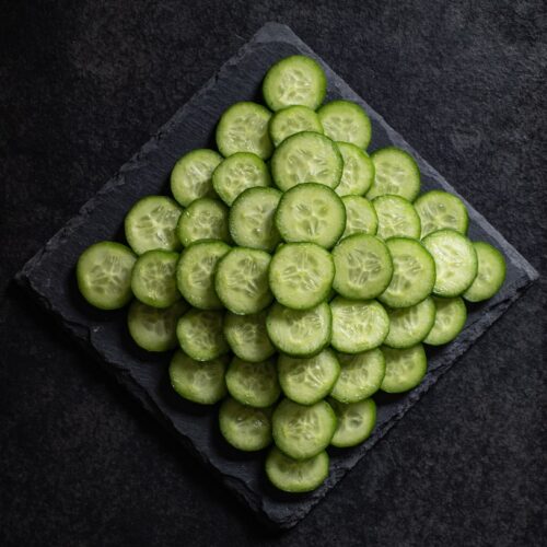 green round fruit on black textile