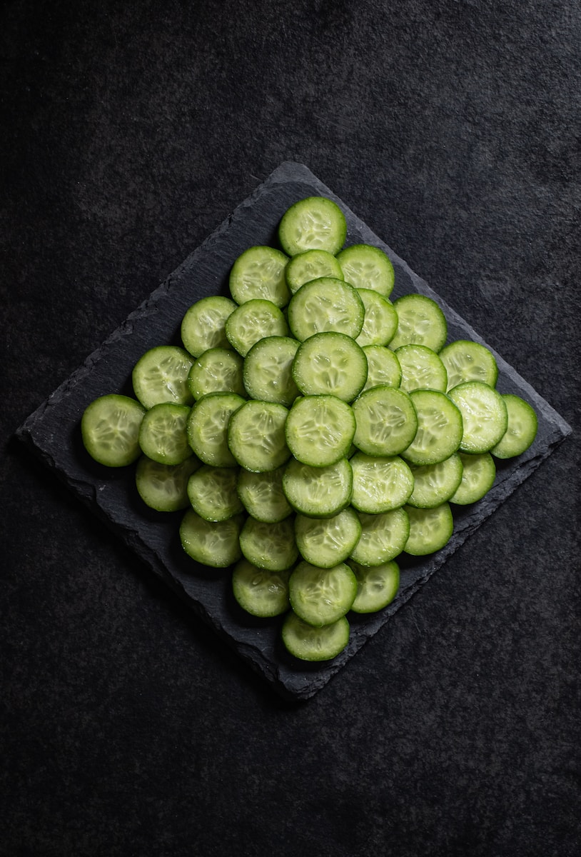 green round fruit on black textile