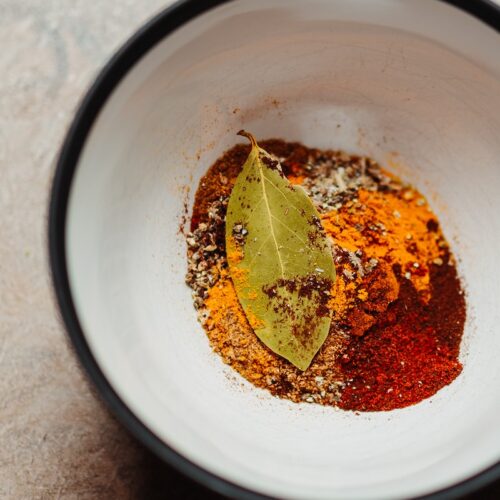 red chili powder on white bowl