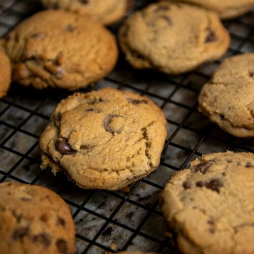 brown cookies on black metal grill