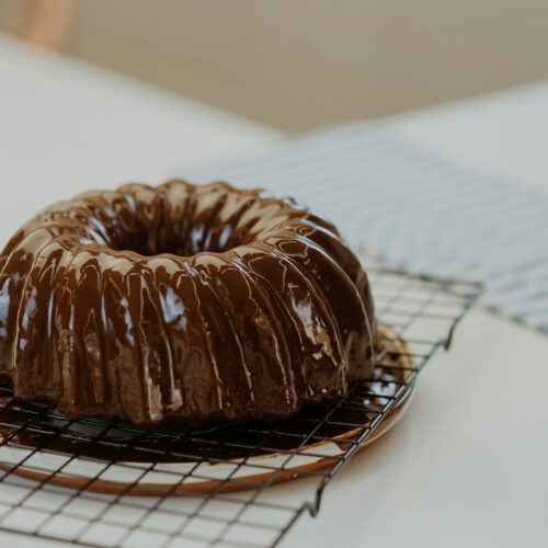 chocolate doughnut on white paper