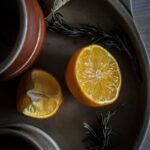 photo of sliced orange fruit on tray